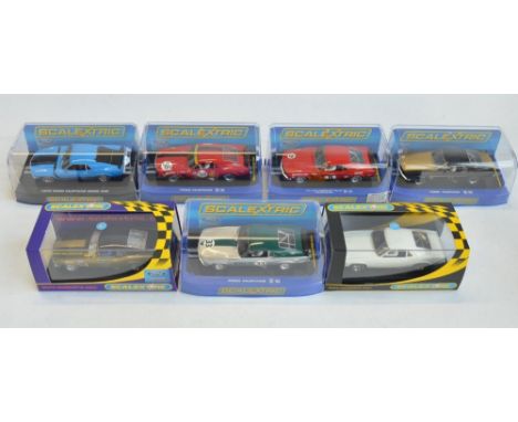 Seven 1/32 scale Ford Mustang slot car racing models from Scalextric to include C2450 Plain White '69, limited edition C2775 