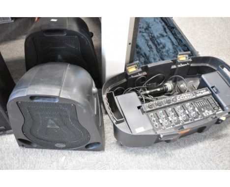 A Carlsbro T150 traveller PA (armadillo style), includes one microphone and XLR cable