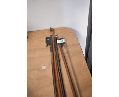 Four violin or cello bows (af)