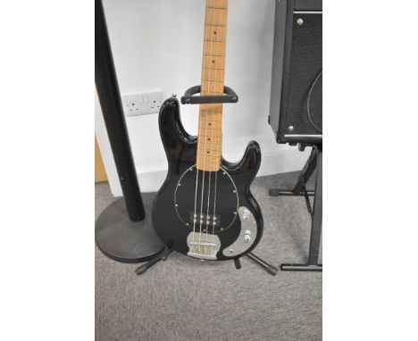 A Stag 'musicman' style bass guitar, sold with guitar stand