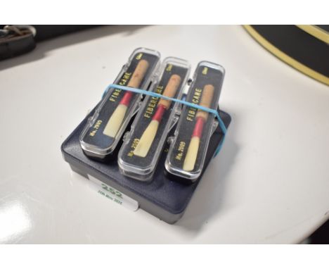 Three boxed oboe reeds, Fibercane No 2009, and a selection of reeds in Early Music Shop Bradford box