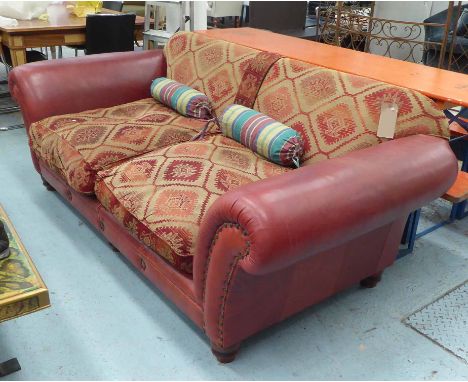 TETRAD EASTWOOD SOFA, two seater, upholstered in studded leather and geometric kilim pattern fabric, on turned supports (r.r.