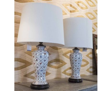 LAMPS, a pair, ceramic with gilded foliate Chinoiserie style decoration, 62cm H, with shades. (2)
