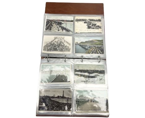 Edwardian and later postcards mostly relating to piers, housed in a ring binder album, approximately 160