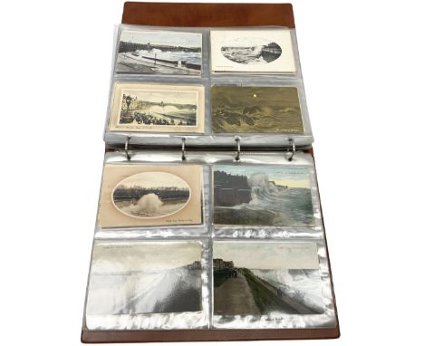 Edwardian and later postcards mostly relating to stormy seas, housed in a ring binder album, approximately 160