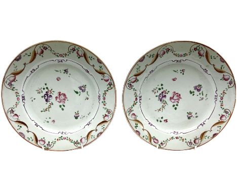 Pair of 18th century famille rose Chinese glazed porcelain plates with floral and foliate decoration, D23cm. 