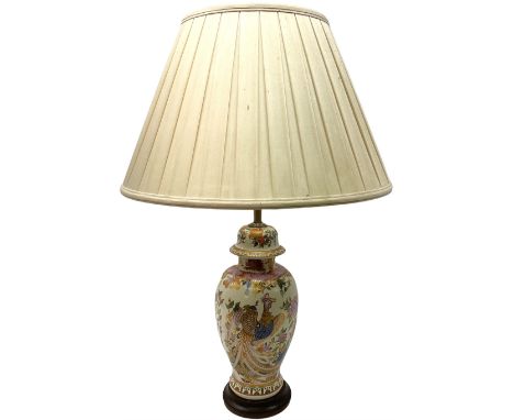 Table lamp of baluster form, decorated in the Oriental style with phoenix and dragon amidst blossoming flowers, with plated c