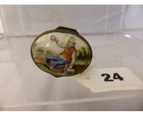 An antique pictorial enamelled oval pill/patch box, sky blue ground, top depicting a country scene with drunkard sitting on a