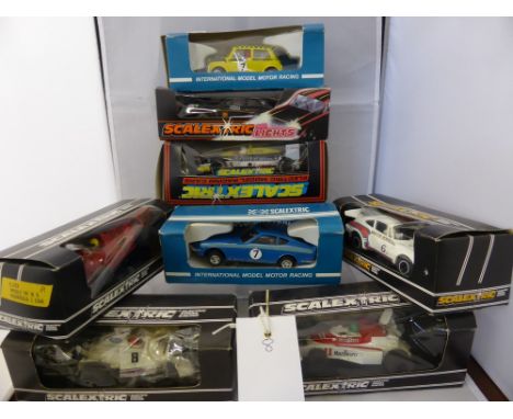 A collection of eight boxed vintage Scalextric cars, consisting of - c1975 Datsun 260Z C053, c1976 Mini 1275 G.T rally specia