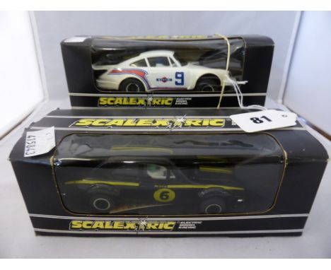 Two vintage boxed Scalextric cars, c.1974 - Ford Escort Mexico special build C052, Porsche Turbo 935 " Martini " C125. (2)