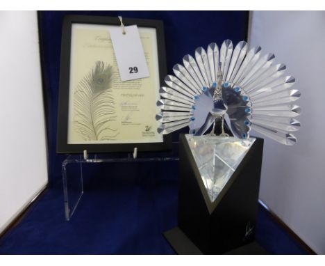 A limited edition Swarovski Peacock, item No: 218123, with framed certificate of Authenticity 1998, 'We hereby certify that T