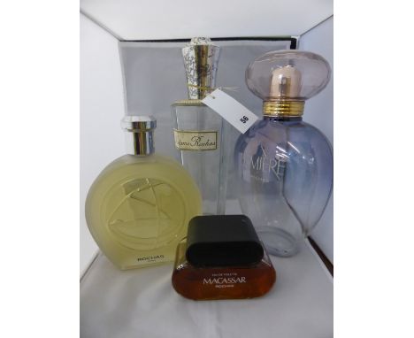 An extra large vintage Madame Rochas glass factice ( display ) counter top perfume bottle; together with three other Rochas b