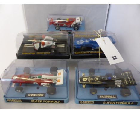 A collection of five boxed vintage Scalextric carsconsisting - 1982 motorcycle combination C281, 1972 March Ford 721 C026, 19