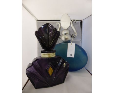 An extra large vintage blue moulded glass factice ( display ) counter top perfume bottle; together with extra large purple gl
