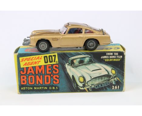 Boxed Corgi 261 James Bond 007 Aston Martin DB5 diecast model with 2 x ejector henchmen figures, Corgi brochure list, secret 