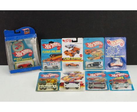 Nine carded Mattel Hot Wheels diecast models to include redline Rodger Dodger in purple, HiRakers No 1131 40s Woodie in main 