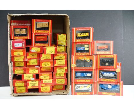 41 Boxed Hornby OO gauge items of rolling stock to include R6685 Hornby Works Wagon 60th Anniversary, R149 Hunting Open Wagon