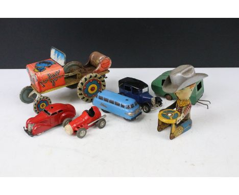 Six tin plate models to include Schuco Varianto Bus 3044 in blue, Schuco 3000 in red, Schuco Micro Racer, Rodeo Joe and 2 x T