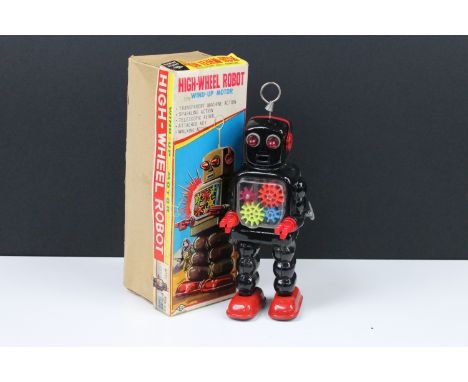 Boxed KO Japan tin plate High Wheel Robot with wind up motor, in main body black, ex condition with gd box that has tear to l