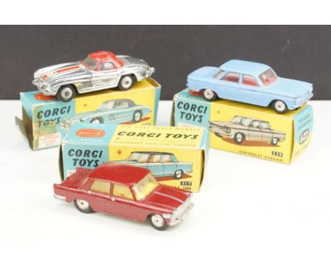 Three boxed Corgi diecast models to include 304S Mercedes Benz 300 SL Hardtop Roadster in chrome with red roof, 229 Chevrolet