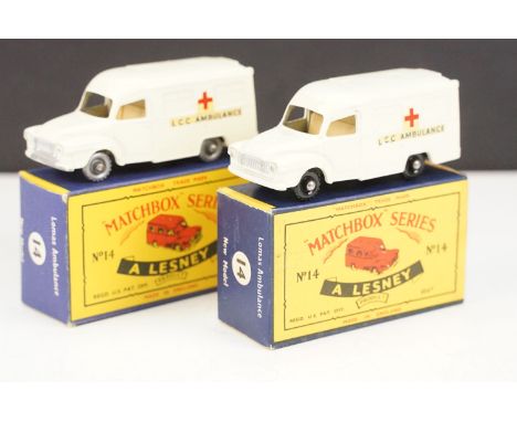 Two boxed Matchbox 75 Series No 14 Lomas Ambulance diecast models, both variants, one with silver wheels, the other in black 