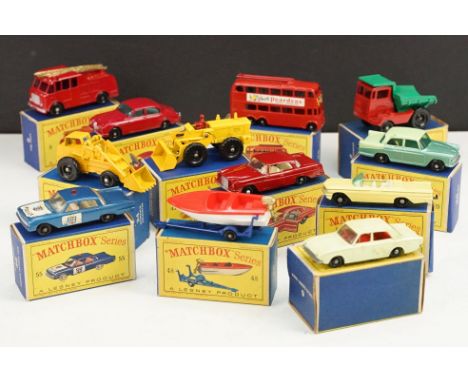 12 Boxed Matchbox Series diecast models to include 65 Jaguar 3.8 Sedan, 39 Pontiac Convertible, 55 Police Patrol Car, 48 Trai