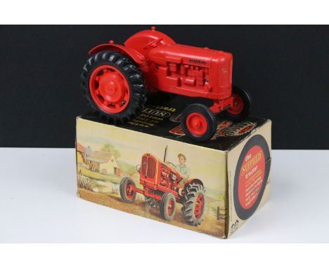 Boxed Pippin Toys The Nuffield Tractor plastic model in red, missing exhaust, otherwise in excellent condition with gd overal