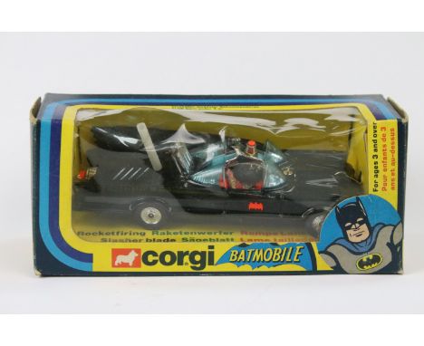 Boxed Corgi 267 Batmobile diecast model with both Batman &amp; Robin figures and 6 x missiles on plastic spruce, diecast ex w