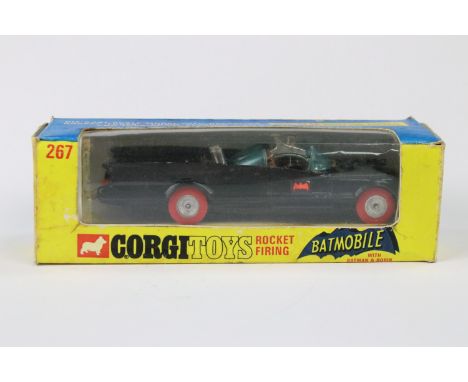 Boxed Corgi 267 Rocket Firing Batmobile diecast model with both Batman &amp; Robin figures, with red wheels, diecast vg with 