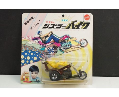 Carded Mattel Hot Wheels (1971) Japanese issue Chopcycles Bruiser Cruiser metal model motorbike in dark brown with yellow rid