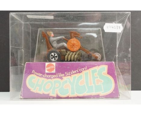 Boxed Mattel Chopcycles Triking Viking model in brown main body, silver rider with gold helmet, un-removed from excellent bub