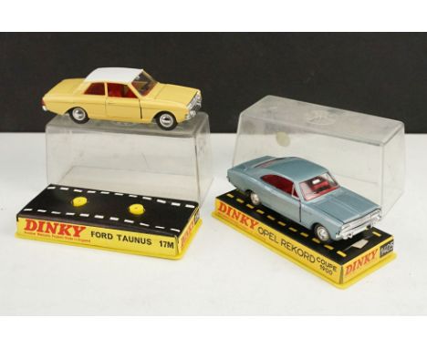 Two boxed / cased Dinky diecast models to include 154 Ford Taunus 17M in mustard yellow with red interior and white roof and 