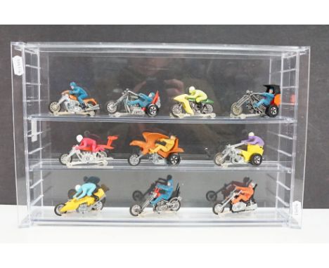 10 Mattel Hot Wheels Rrrumblers models to include Road Hog in light brown body, blue rider with blue helmet, Torque Chip in r