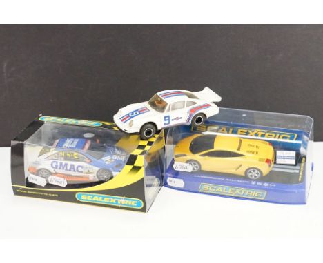 Two cased Scalextric slot cars featuring C2810 Lamborghini Gallardo (yellow) &amp; C2569 Opel V8 Coupe "GMAC" No8 plus 1 x un