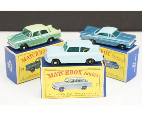 Three boxed Matchbox 75 Series diecast models to include 57 Chevrolet Impala in two tone blue, 29 Austin A55 Cambridge in two