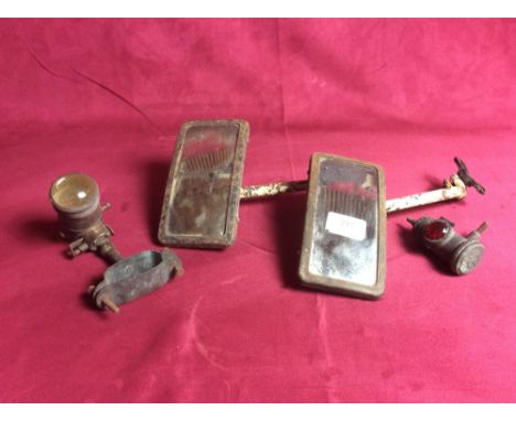 Two vintage side mirrors and two rear brass lights