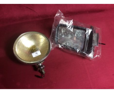 A Lucas fog lamp S/N fst7005 and a wing mirror for a Vauxhall Cavalier with original box