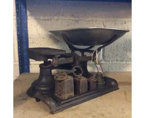 A set of vintage scales and weights