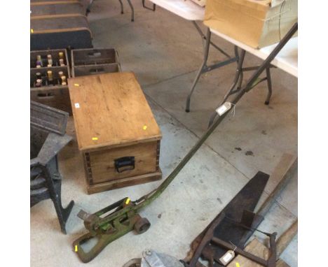 An iron vintage car jack