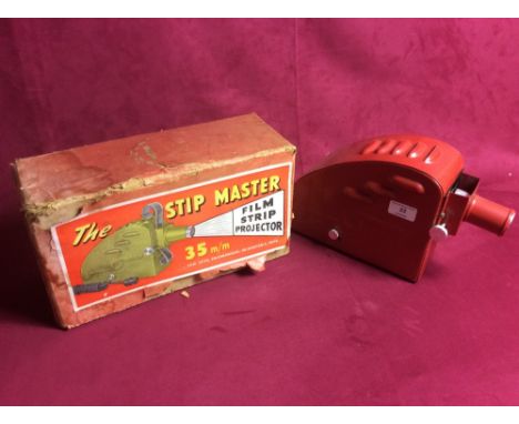 A Stip Master film strip projector in original box