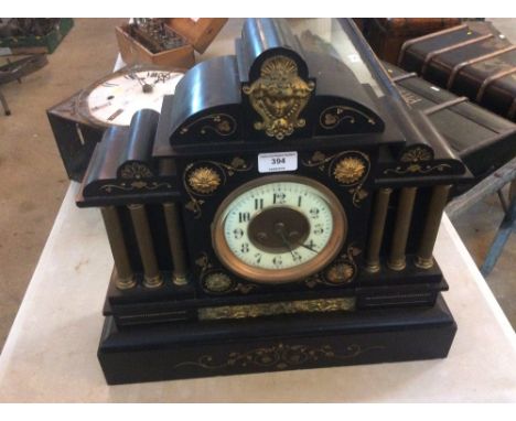 A Victorian marble cased mantel clock of architectural design having 8 day movement striking on a bell