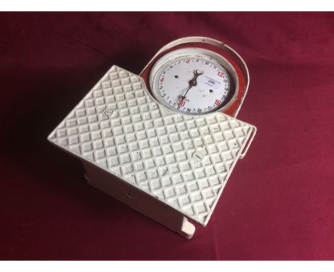 A set of vintage bathroom floor scales