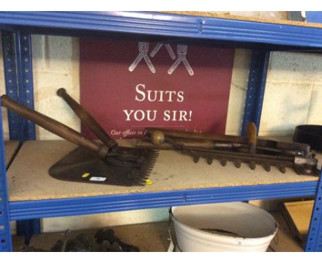 Three vintage thatching tools, including a "Crab" cutter