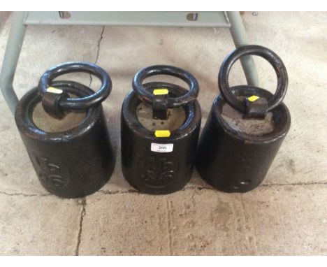 Three vintage 56lb cylindrical weights