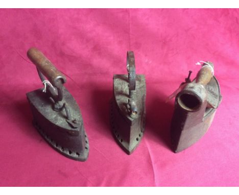 Three large vintage flat irons