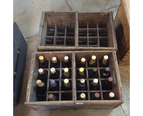 Two vintage Adnams wooden beer crates; and an assortment of old ales