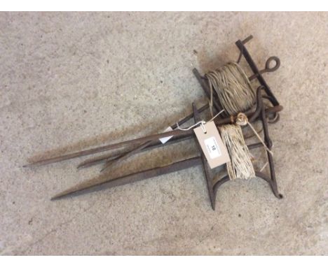 Two vintage iron gardener's lines