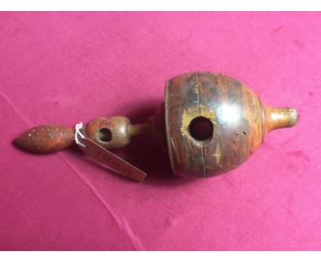 A vintage wooden spinning top
