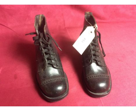 A pair of vintage child's working boots