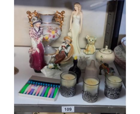 A selection of ornaments and figurines including Goldscheider